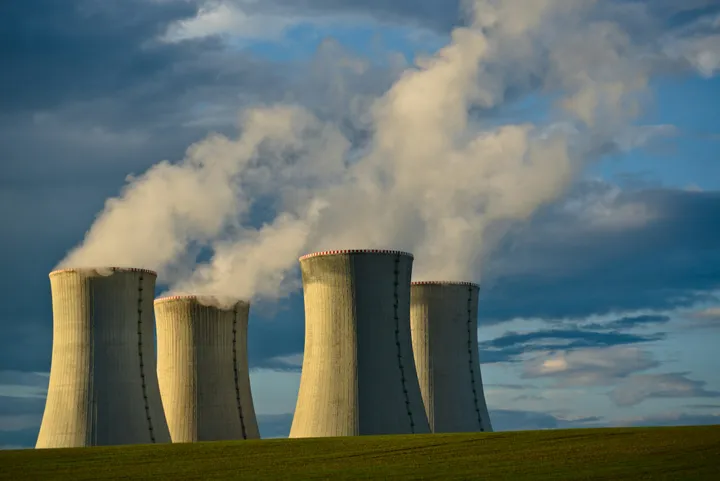 Cooling towers of a power plant under a blue sky